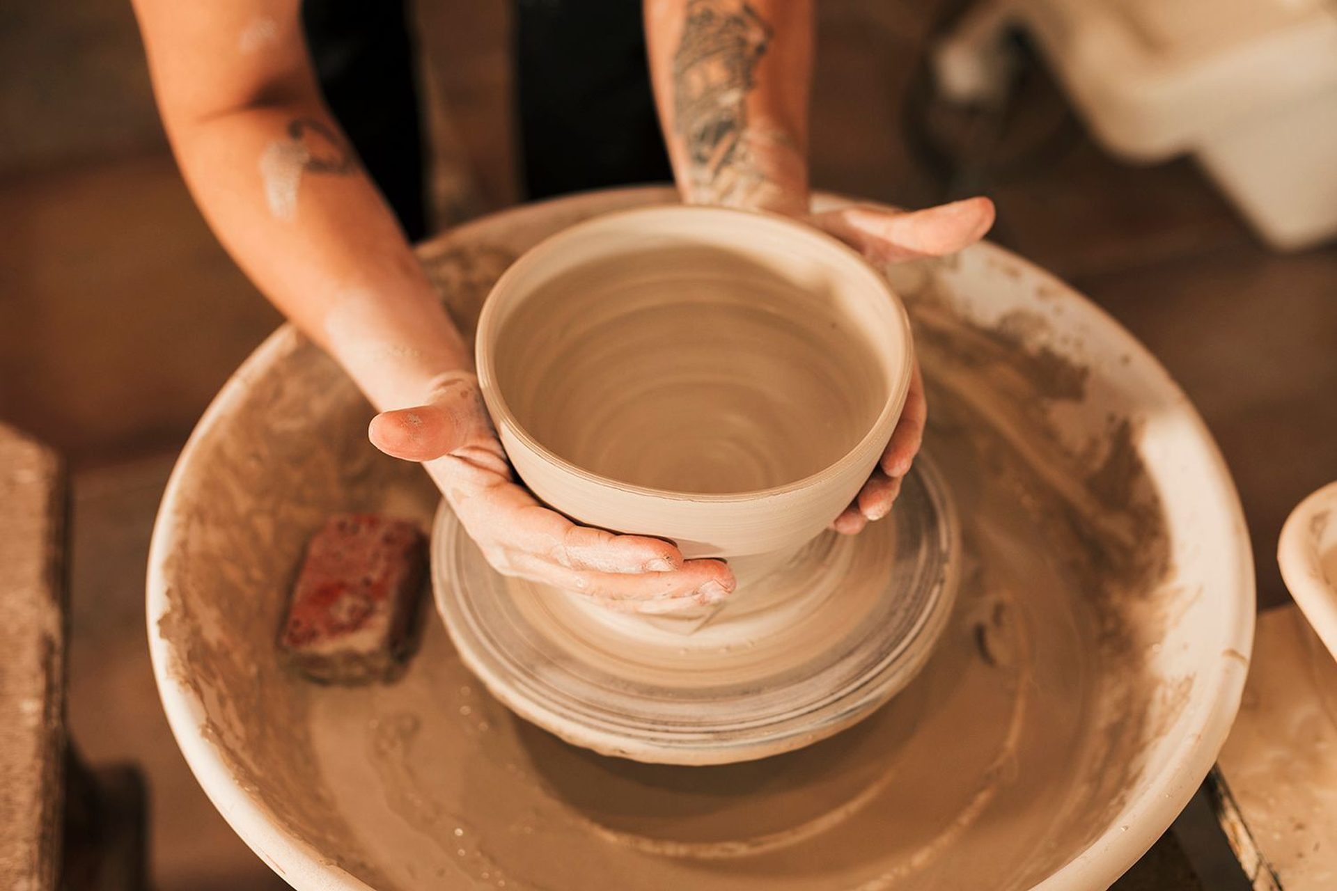 Potter shaping clay on the wheel — Sparkle Stone products are handcrafted