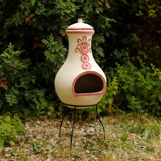 Red clay chiminea by Sparkle Stone in the garden, handcrafted
